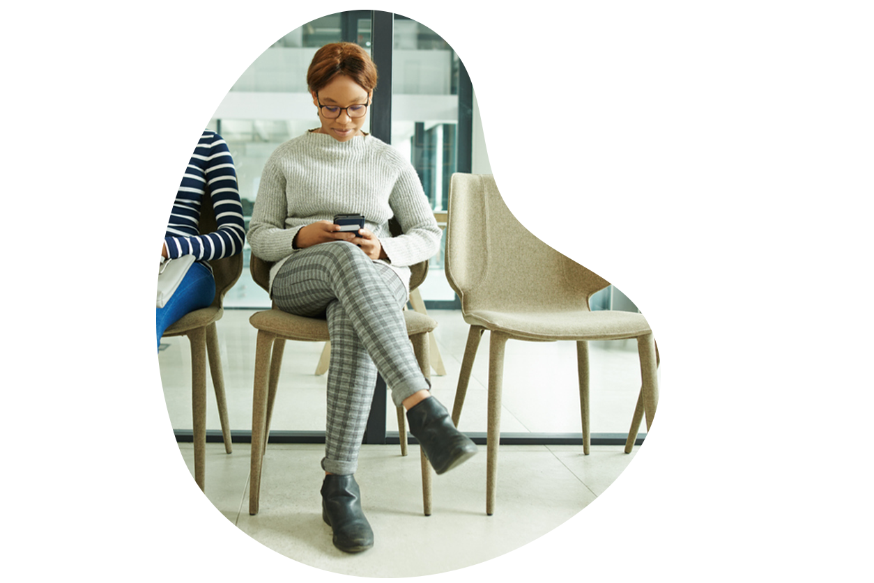 patient on phone in waiting room